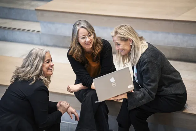 Three women having a meeting.Photo.